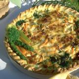 Vegetable quiche in a wooden tart mold